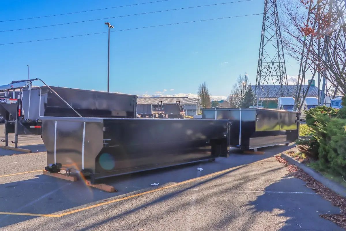 Roll-off dumpster ready for waste disposal at job site for Concrete Dumpster Rental in Princeton
